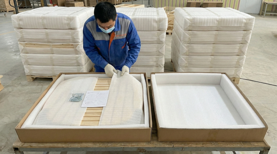 Professional wooden furniture packaging cross-section showing protective layers